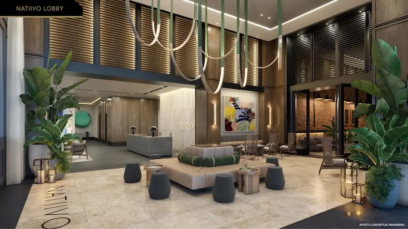 Lobby entrance at Natiivo Fort Lauderdale condos featuring modern design, concierge desk, and luxury finishes